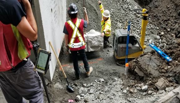 Placement of first culvert block during Charters Road construction project in Sooke, June 2024